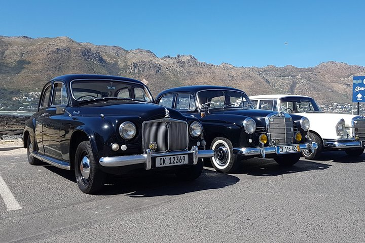 The 1956 Rover P4 parked alongside some lovely Mercedes